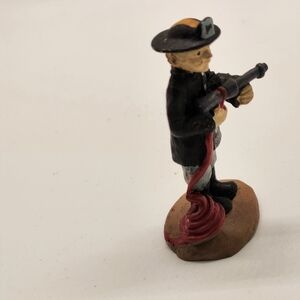 Handcrafted Firefighter Figurine - Black and Red